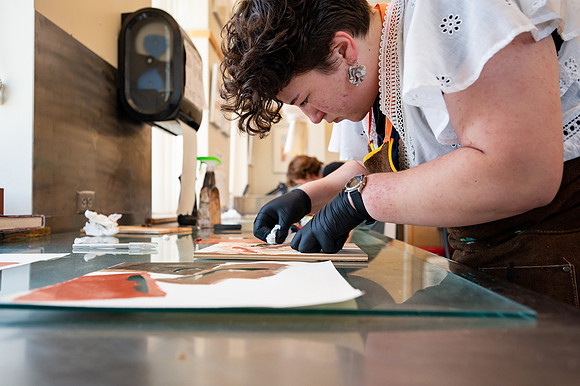 Students working in Printmaking 2 in the Spori Building.