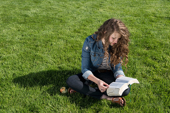 Student models interact and smile for marketing purposes that will be used for the new Campus Housing next to The Ivy.