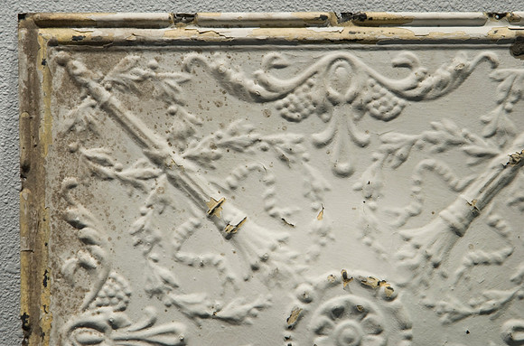 Tin ceiling tile out of the old Spori Building.