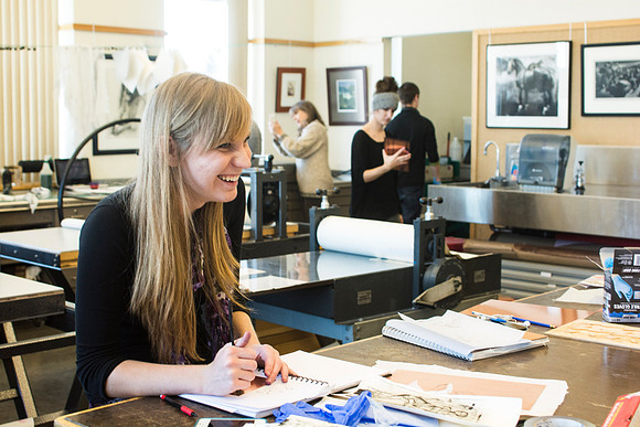 Art students at work in their hands-on print making class.
