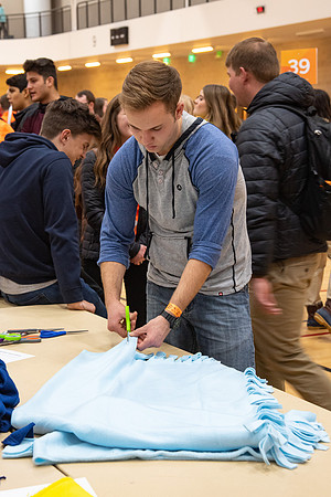 New Students get involved by doing different small service projects to start the semester.