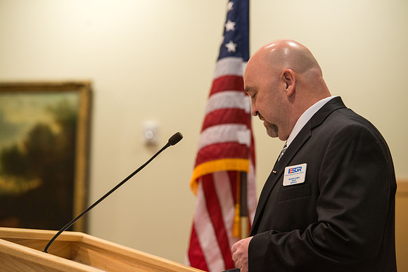 Todd Smith receiving an award on behalf of BYU-Idaho from the Office of the Secretary of Defense for the support BYU-Idaho has given to Peter Stilling while he has been serving in the Guard. Awarded b
