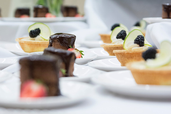 Minidort Chocolate Torte and Key Lime Tart is neatly organized on the dessert table for lunch during the 2014 Spring Semester PAC.