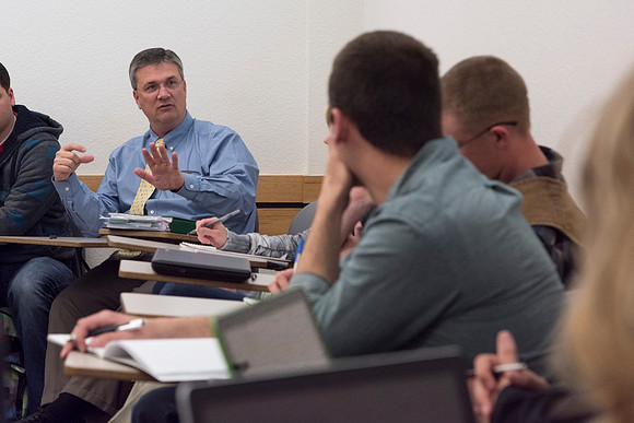 Brother Roberts talks with his Sociology class during the 2014 Spring Semester.