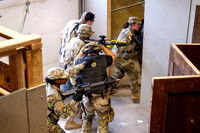 ROTC practices military tatics in an Advantage Airsoft facility.