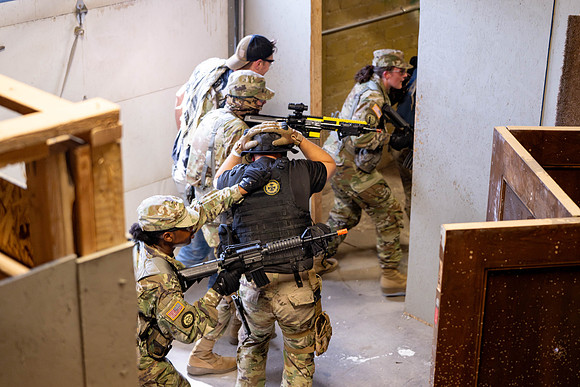 ROTC practices military tatics in an Advantage Airsoft facility.