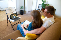 A couple watching Elder and Sister Renlund's live broadcast devotional to BYU-Idaho from Salt Lake City because of travel restrictions during Covid-19 pandemic.