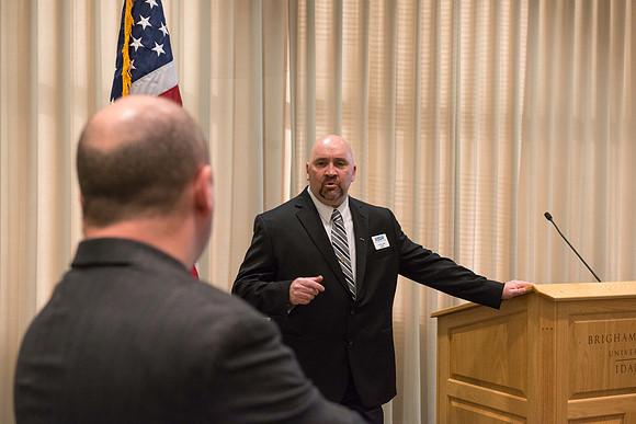 Todd Smith receiving an award on behalf of BYU-Idaho from the Office of the Secretary of Defense for the support BYU-Idaho has given to Peter Stilling while he has been serving in the Guard. Awarded b