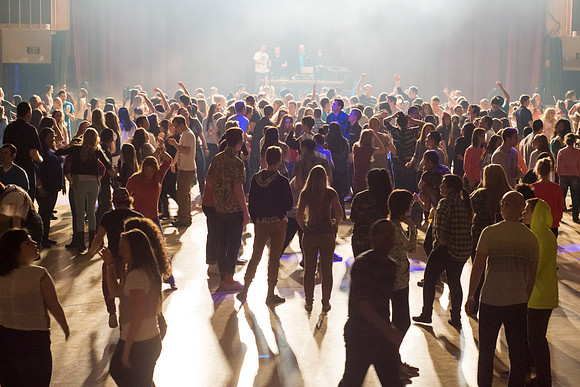 Students dance at an animal-themed dance party at in the Hart Gym.