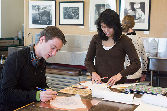 Art students at work in their hands-on print making class.