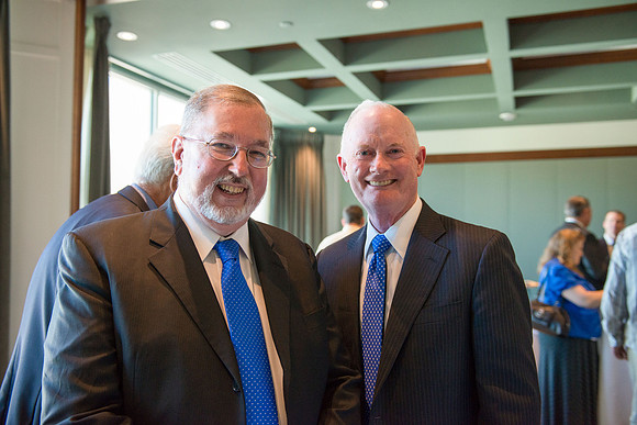 Kim B. Clark, President of Brigham Young University-Idaho, poses with this years Sacred Music concert composer, Daniel Gawthrop, at a reception before the concert. Photo by Ryan Chase