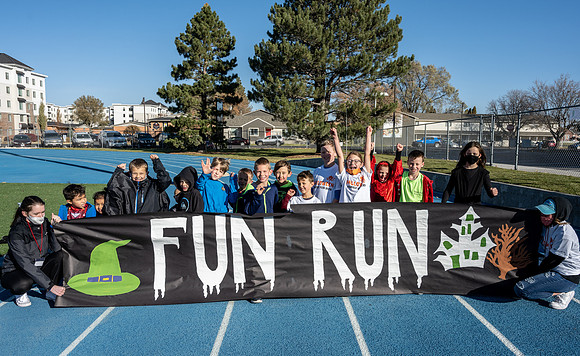 BYU-Idaho employees and their families enjoy a beautiful fall day at the stadium track.