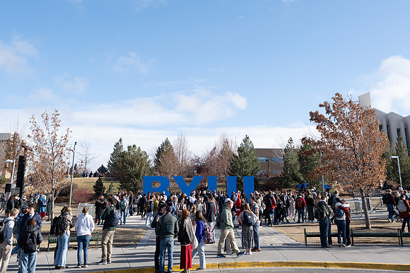 President and Sister Meredith participate in unveiling the new BYUI monument.