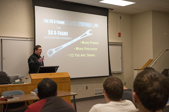 Beau Calderwood received a toolset from SK Tools during a Presentation by Rob Conrad in the Austin Building for beating the Crew Chief at SEMA.