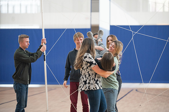 Student Support employees participate in team-building activities in the Hart Gym.