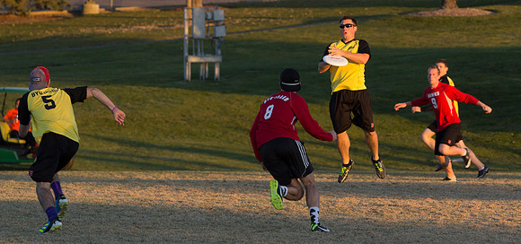 Teams compete during an Ultimate Frisbee game.