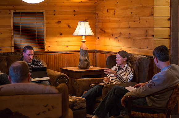 Retreat for teachers at the Sky Mountain Lodge in Victor, Idaho. Participants divide into smaller groups and share teaching techniques with each other.