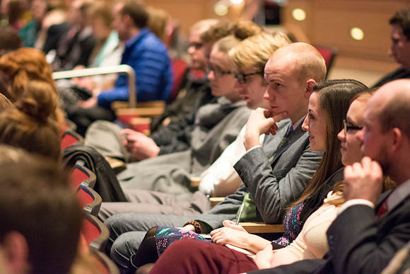 Students at Brigham Young University-Idaho taking notes during the Worldwide Devotional held in the BYU-Idaho Center on Sunday, 11 January, 2015. Photo by Ryan Chase