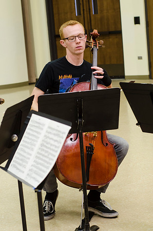 A member of the Shanghai String Quartet working with student ensembles.