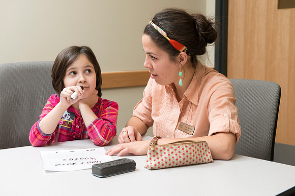 Teacher Education students offer their services tutoring kids 3rd grade to 12th grade. Kim Argueta tutoring Jenna Davis.