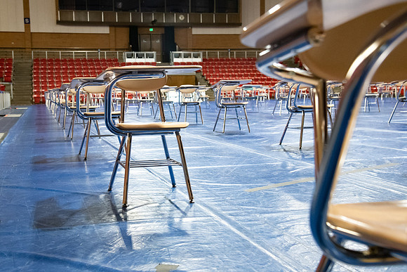 Desks in the Hart gymnasium set 6ft apart to practice physical distancing in efforts to fight the COVID-19 virus.