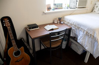 Scriptures on a desk in a clean student bedroom