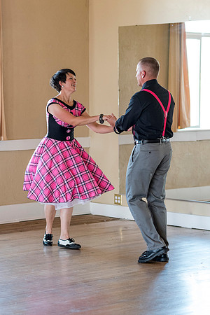 Adam and Jennifer Anderson dancing at the Woodman Ballroom for Online Recruiting marketing material.