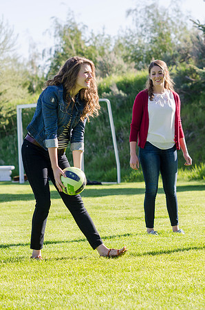Students enjoy a lighthearted game of volleyball.