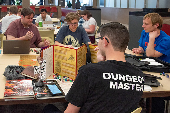 Students playing Dungeons and Dragons during Game Night at the Manwaring Center.