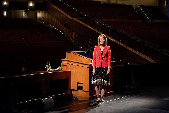 Amanda Kingsford speaks in devotional to an empty auditorium due to Covid-19 restrictions.