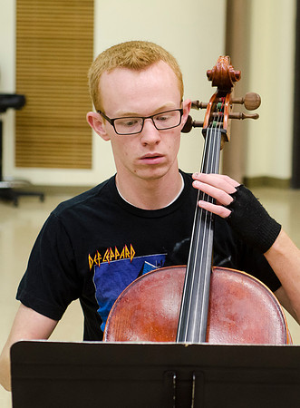 A member of the Shanghai String Quartet working with student ensembles.