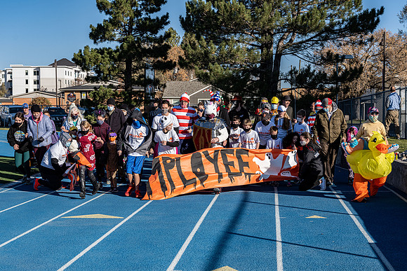 BYU-Idaho employees and their families enjoy a beautiful fall day at the stadium track.