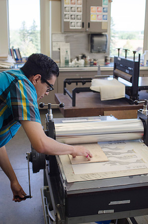A student in Sister Jimison's Printmaking class uses to complete an assignment during the 2014 Spring Semester.
