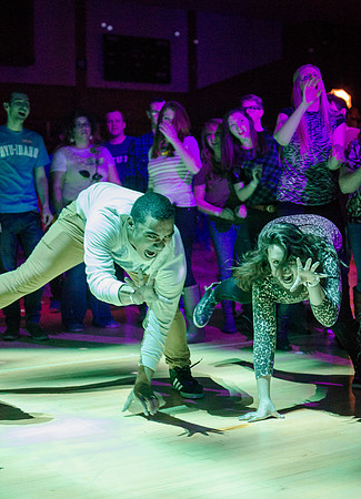 Students dance at an animal-themed dance party at in the Hart Gym.