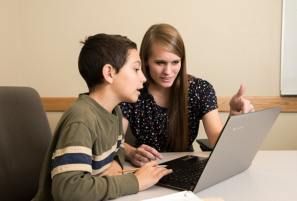 Teacher Education students offer their services tutoring kids 3rd grade to 12th grade. Hannah Paget tutoring Jaden Davis.