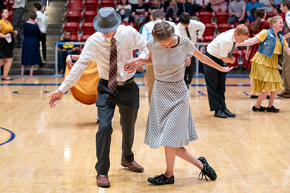 Students perform in a dance competition at the Hart Auditorium.