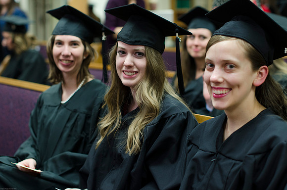 Student Graduates at the College of Education and Human Development Convocation in the HInckley Chapel.