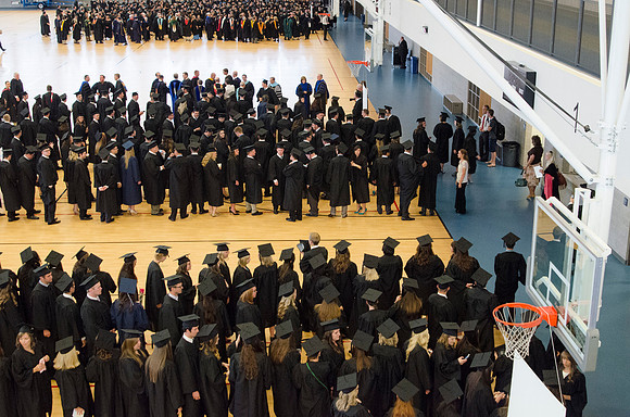 Graduating students from the 2014 Spring Semster gather in the I-Center for commencement. Photo by Tyler Rickenbach