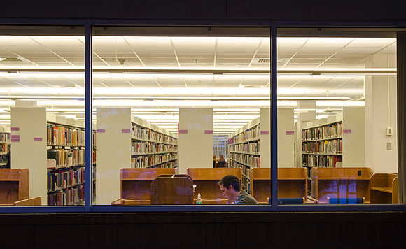 A student finds a quiet corner of the Library.