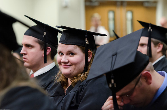 Student Graduates at the College of Education and Human Development Convocation in the HInckley Chapel.