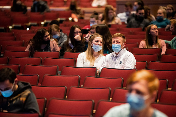 Students gather at the I-center to watch the devotional given by Holly Johnson.