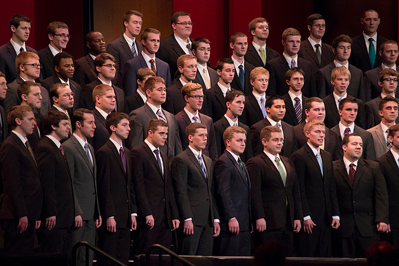 The Men's Choir performs a special musical number during Devotional.