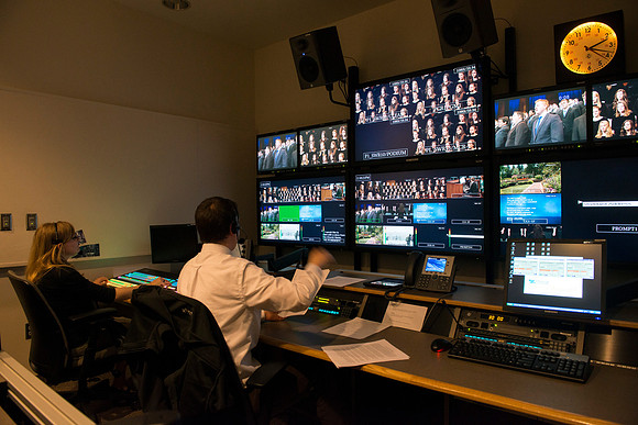 Behind the scenes of devotional in the AV_Control Room. Mike Jeffs directs the camera's during devotional.