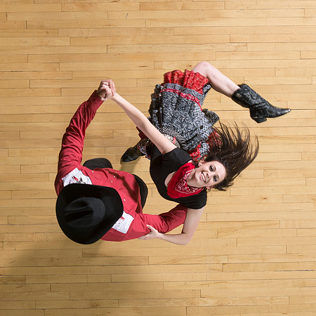 Marketing photos shot from the catwalk in the Hart Gym for their upcoming tour.