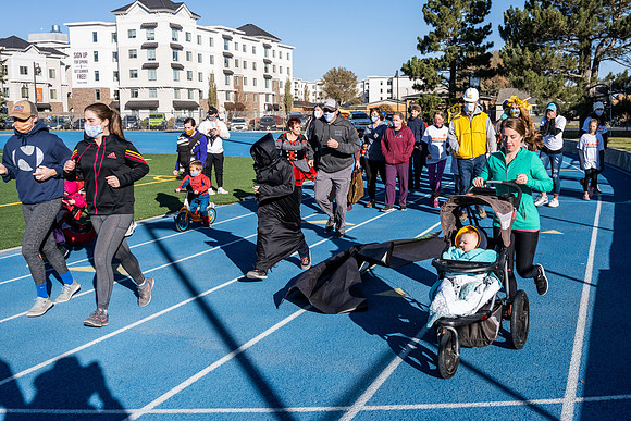 BYU-Idaho employees and their families enjoy a beautiful fall day at the stadium track.