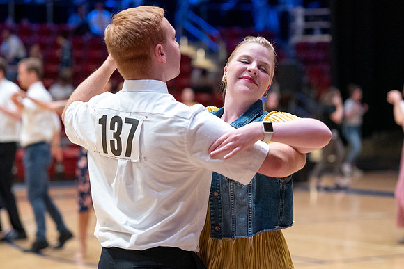 Students perform in a dance competition at the Hart Auditorium.