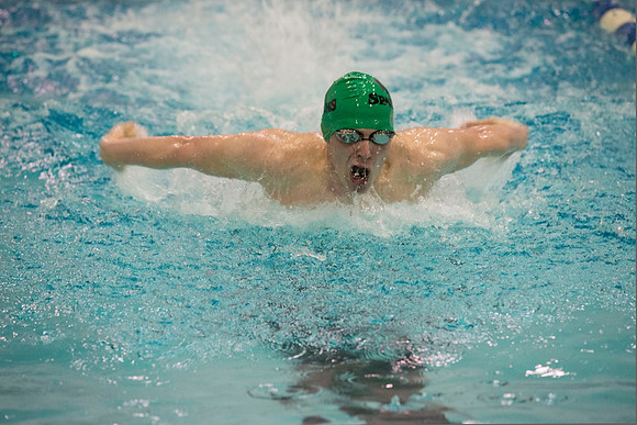 BYU-Idaho swimmers swim in the championship held in the Hart Building