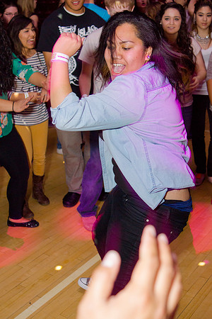 Students dance at an animal-themed dance party at in the Hart Gym.