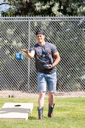 Students participate in the campus spikeball and cornhole tournament.