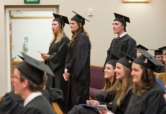 Students of the College of Human Development receive their diploma cover.
